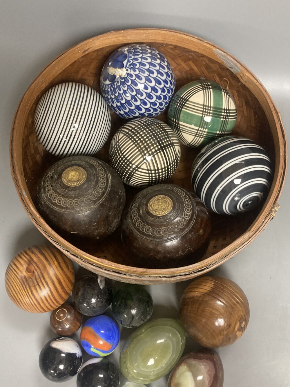 A collection of Scottish ceramic and other carpet bowls